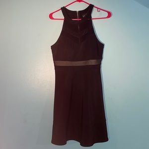 Black halter homecoming dress with mesh detailing